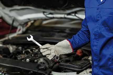 Noukoua Auto mechanic at work